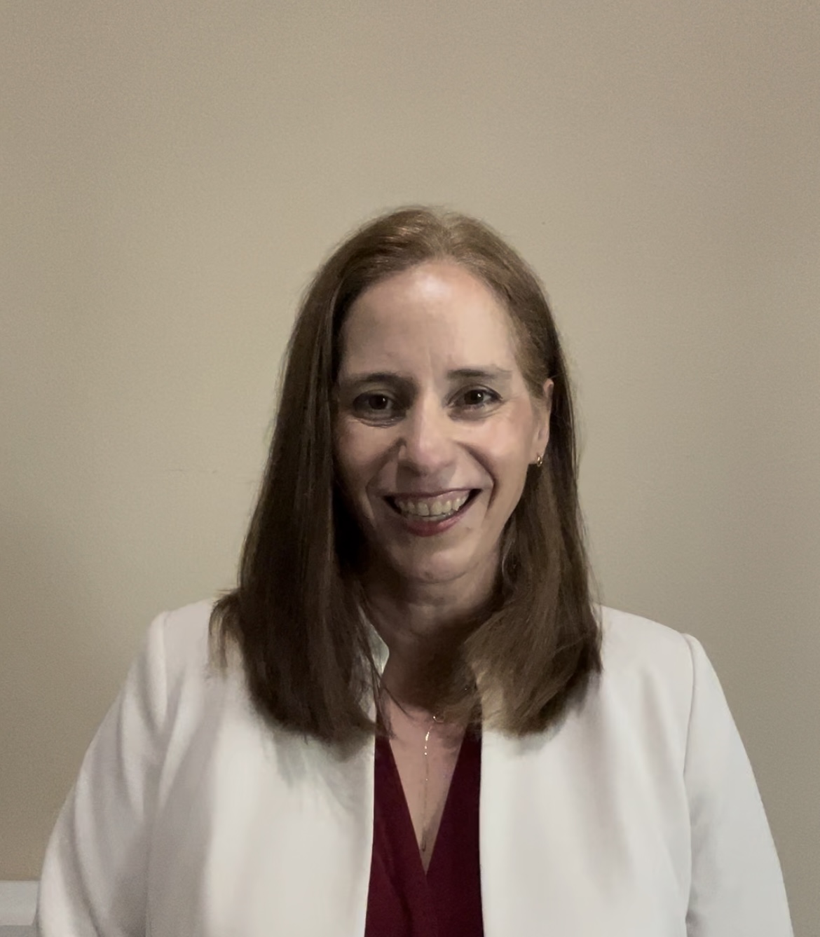 Emily Lewis-Pinnell in a boardroom setting